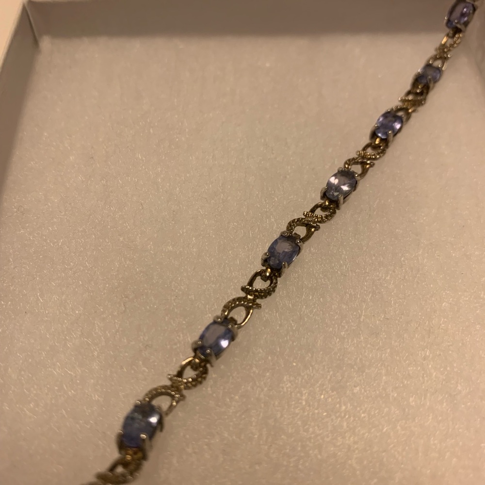 Women’s silver bracelet with blue stones